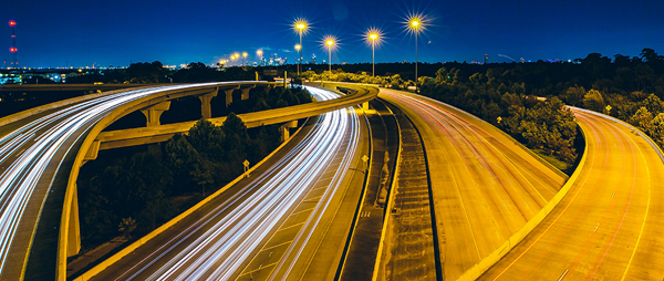 An image of a highway at night.