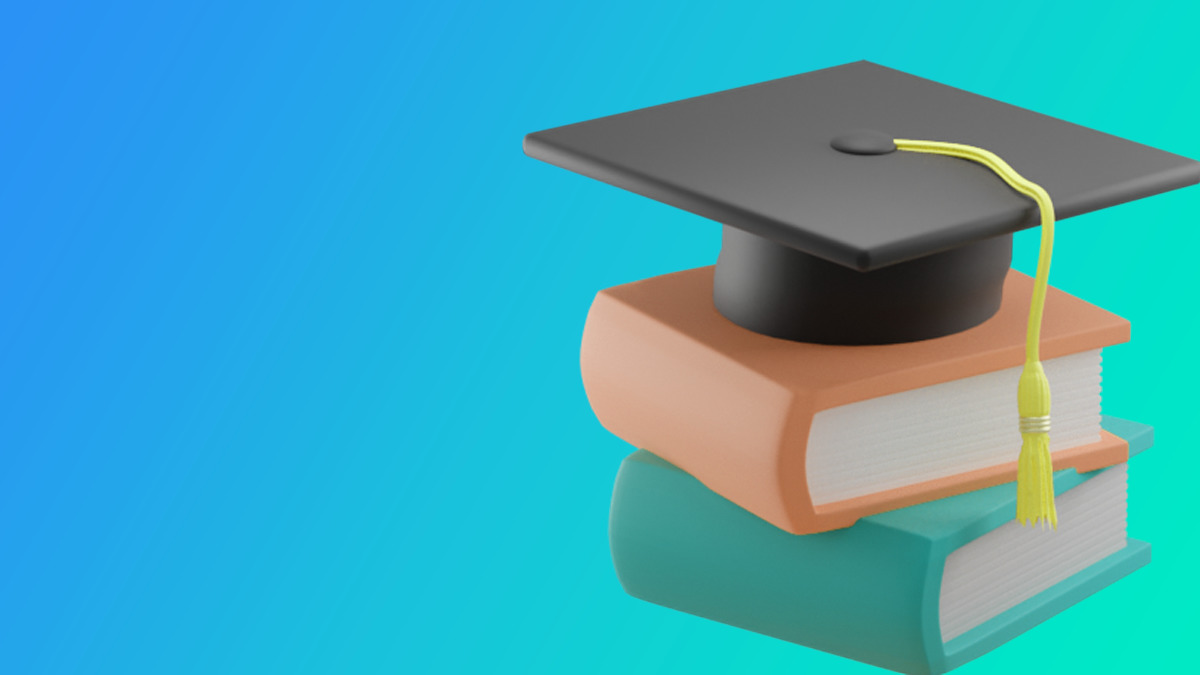 A graduation hat sitting on two books