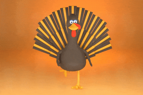 Animated turkey walking behind "Happy Thanksgiving."