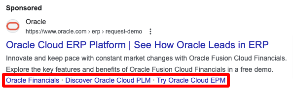 Sitelink extension example appearing in Google search ad
